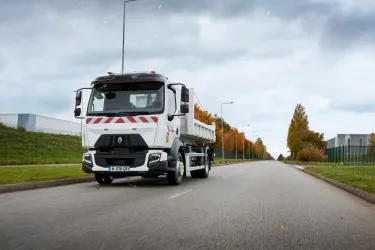 Renault Trucks D 12-tonne / 14-tonne fitted with a Hiab crane on the road